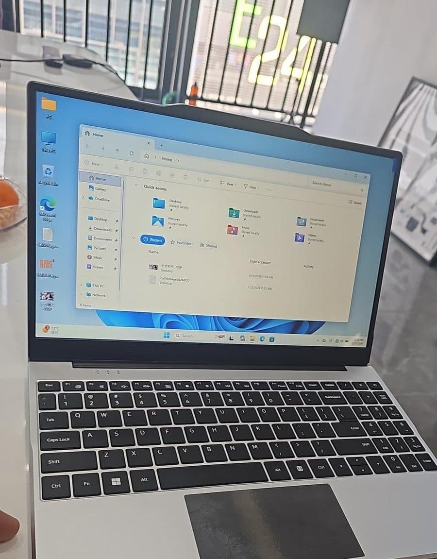 A Kotlead Laptop open on a desk, running Windows 11.